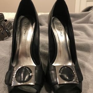 Women's BCBGirls heel with a peeptoe and buckle